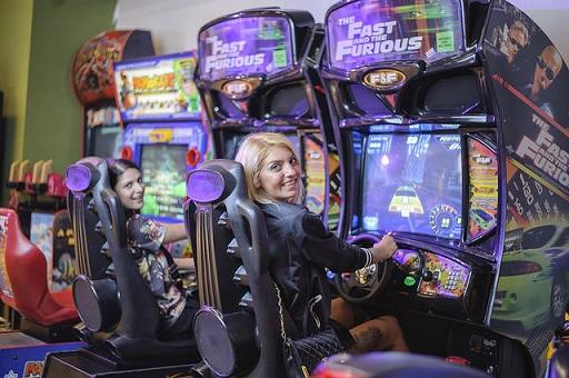 girls playing arcade games